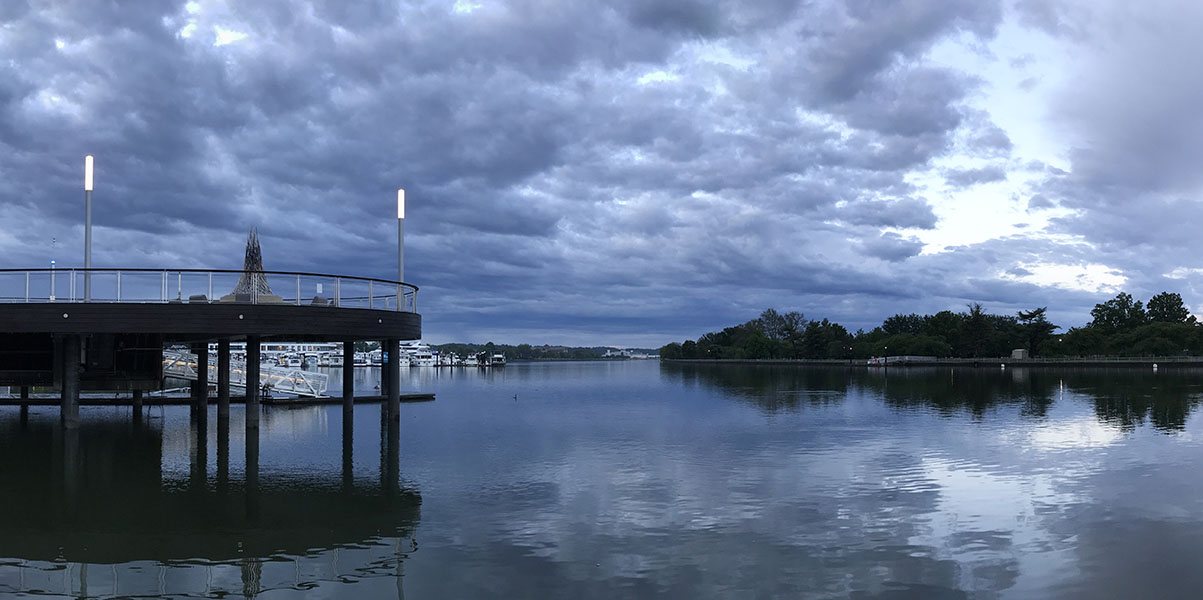 Blue Clouds and Their Reflection in Water
